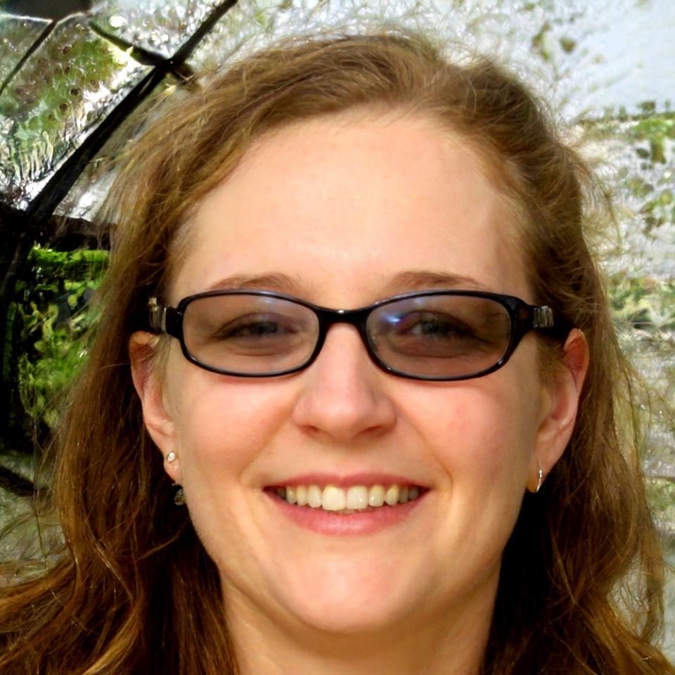 Professional headshot of program graduate